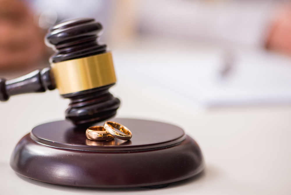 Family Lawyer - Judge gavel deciding on marriage divorce
