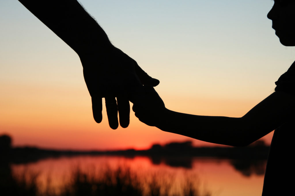 How to Be Civil with Your Ex During Divorce - silhouette parent and child hands