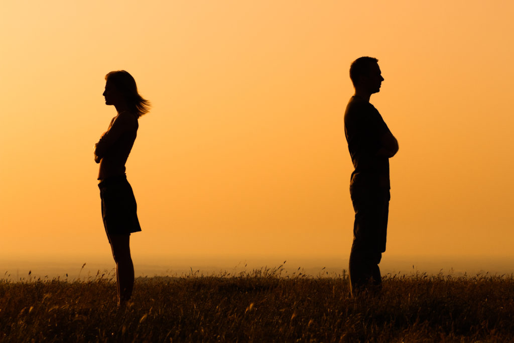 Common Divorce Mistakes You Should Avoid - Silhouette couple standing on hill sunset sky